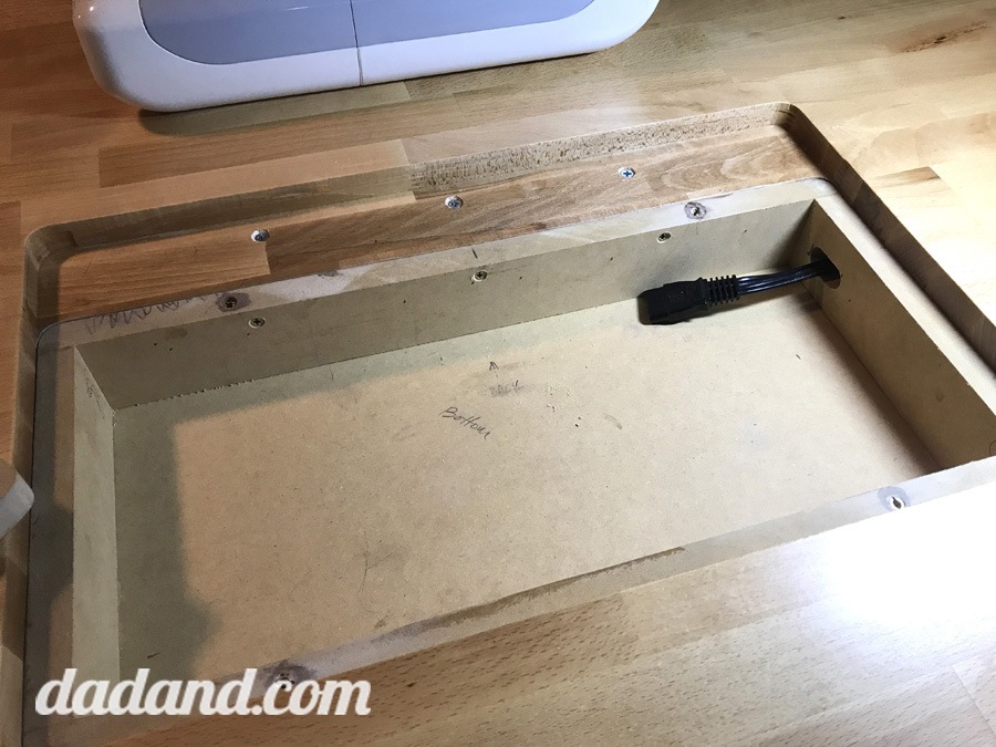 crating access for power cords in the sewing table